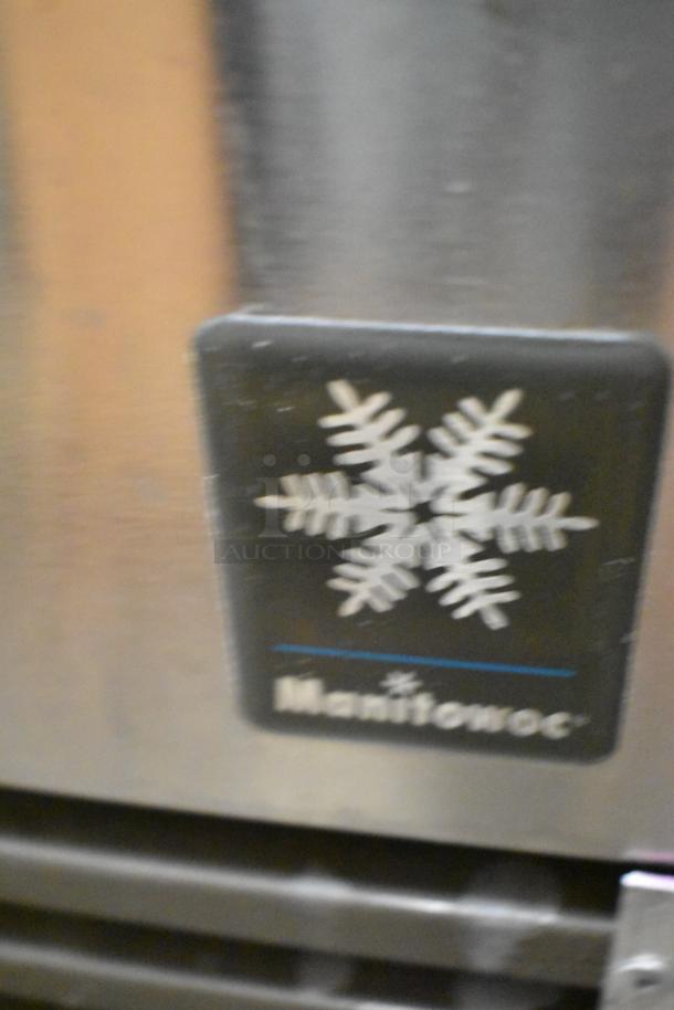 Manitowoc QY0214A stainless steel undercounter ice machine, 115 volts, 1 phase. Logo label visible.