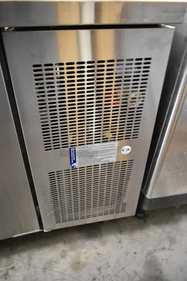 Randell 8268N stainless steel pizza prep table with commercial casters and ventilation panel. 115V, 1 phase. Fair condition.