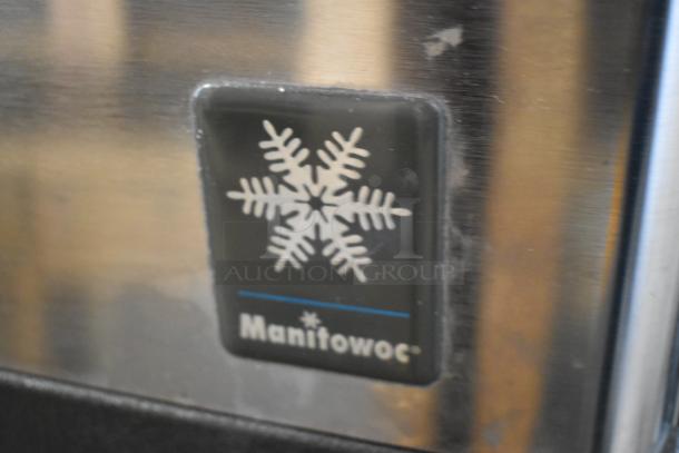 Manitowoc QY0454A stainless steel commercial ice head with visible logo and snowflake design. 115 volts, 1 phase.
