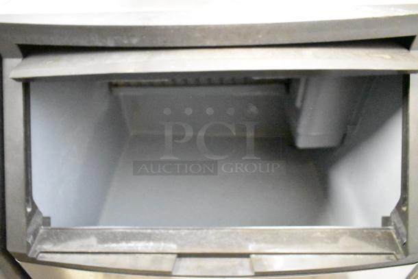 Manitowoc QY0214A stainless steel commercial ice machine, self-contained, 115V, 1 phase, interior view.