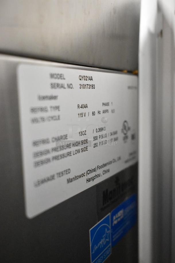 Manitowoc QY0214A ice machine label, showing model, serial number, 115V specifications, and refrigerant details.