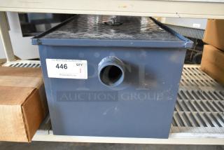Brand new grease trap, gray metal, with side outlet. Auction label: 446, QTY 1, PCAuctions.com.