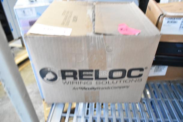 Brand new Reloc OFC 277 12/2G OnePass Fixture Cable in sealed box, visible branding and label, unblemished condition.