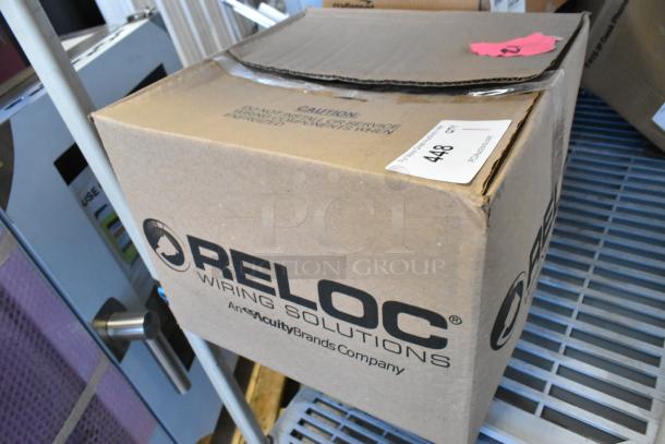 BRAND NEW Reloc OFC 277 12/2G 13 M5 OnePass Fixture Cable in box; labeled "RELOC Wiring Solutions."