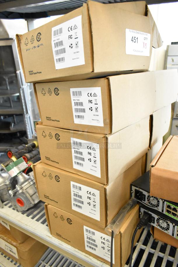 Five sealed boxes of Verizon T41S IP Desk Phones, new condition, labeled with SKU: T41S and CE, FC, RoHS markings.