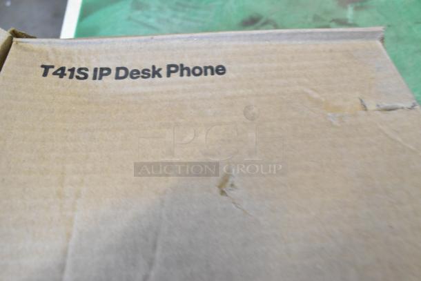 Box labeled "T41S IP Desk Phone," new condition, possibly containing 5 Verizon T41S phones, excellent for office use.