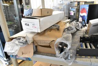 Lot of various new items, including Tripp Lite Cat6 patch panel, boxed, with auction label marked "QTY 1-lot."