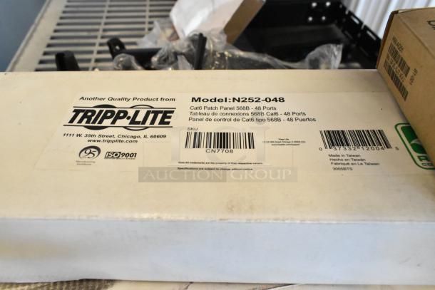 Brand new Tripp Lite Cat6 Patch Panel, Model N252-048, 48 ports, ISO 9001 certified, in original packaging.