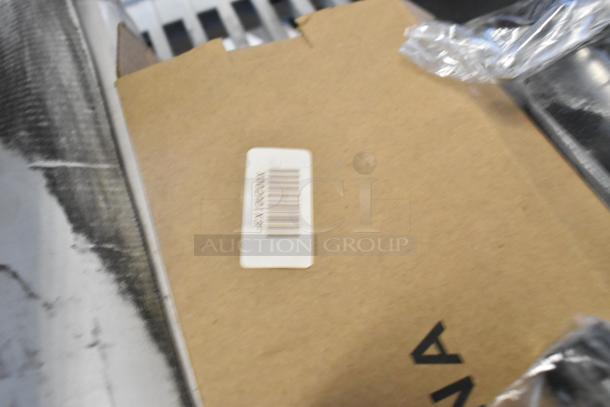 Lot of various brand new items including Tripp Lite Cat6 patch panel, boxed, with visible barcoded label.