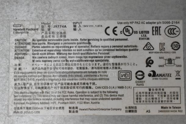 Label of HP J9774A model indicating specifications and compliance; part of three-item auction bundle.