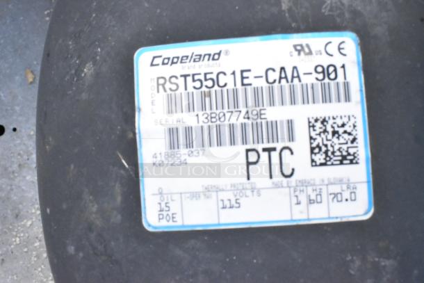 Label for Copeland RST55C1E-CAA-901 compressor; 115V, 1 phase. Serial: 13B07749E. For Kolpak Walk In Box.