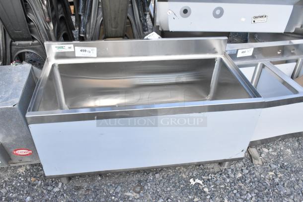 Brand new Regency 600IB1836 18"x36" underbar ice bin, 119 lb. capacity, no legs, minor scratches, price tag visible.
