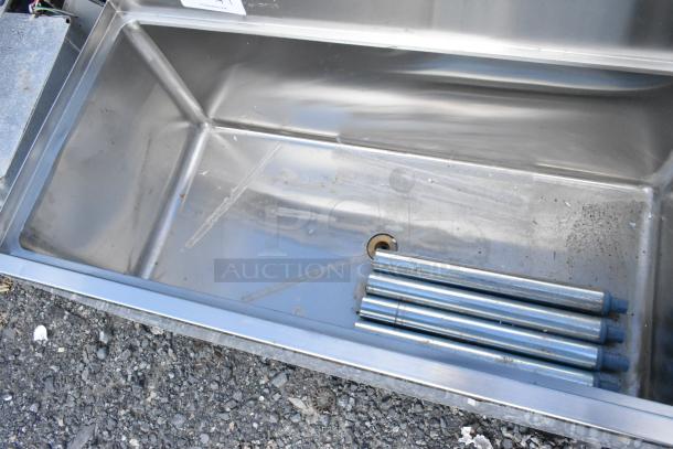 BRAND NEW Regency 600IB1836 18" x 36" underbar ice bin. Holds 119 lbs. Scratch and dent condition, no legs included.