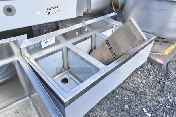 Brand new Steelton 522BS3T38 3 bowl 18-gauge underbar sink, 38" x 18 3/4", with minor scratches and visible tags.