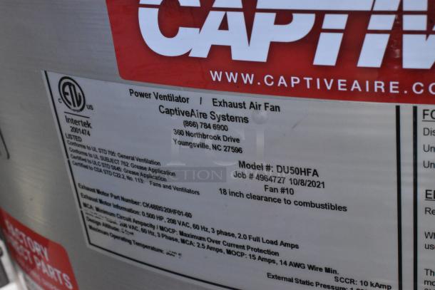 CaptiveAire DU50HFA metal rooftop exhaust fan label detailing model, job number, and specifications. Missing tops.
