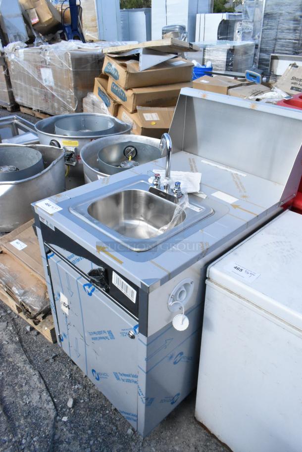 Brand new QualServ WMSC24MS stainless steel portable sink, slight scratches, protective film intact, faucets included.