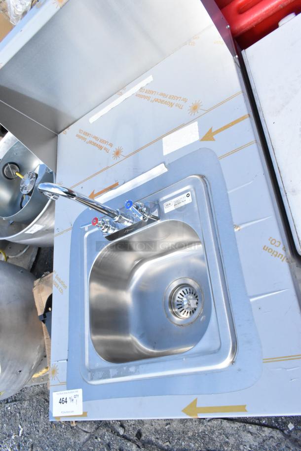 BRAND NEW QualServ WMSC24MS stainless steel portable sink, labeled "scratch and dent," with visible protective wrap.