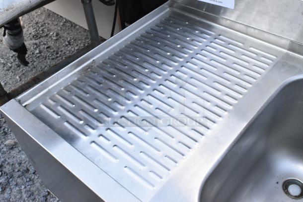 Stainless steel 3 bay back bar sink with dual drain boards and speewell; slightly used condition.