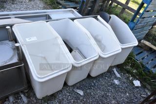 Four white poly ingredient bins on casters, gently used, ideal for storage. Visible label: "475."
