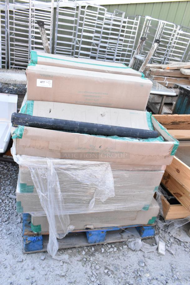 12 new boxes of Quantum 1836P wire shelves on blue pallet, sealed in packaging with protective wrap.