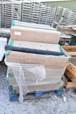 12 new boxes of Quantum 1836P wire shelves on blue pallet, sealed in packaging with protective wrap.