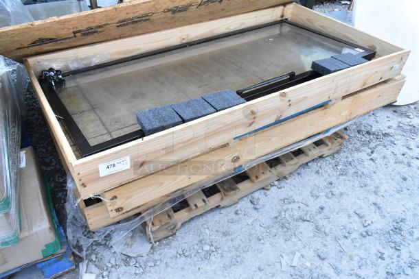 Three brand new glass merchandiser doors in wooden crate, visible label showing "478" and foam padding for protection.