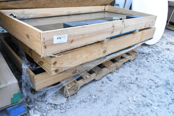 3 brand new glass merchandiser doors in wooden crates, pristine condition, label indicates lot number 478, quantity x3.