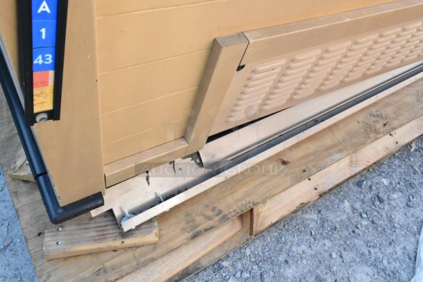 Killion metal commercial open grab-n-go merchandiser, 208/230 volts, 1 phase, beige, fair condition, partial view.
