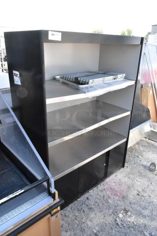 Brand new scratch and dent shelving unit, featuring sturdy metal shelves, visible minor scratches, and top shelf items.