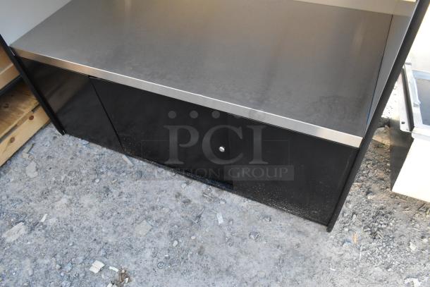 Brand new shelving unit, scratch and dent condition, stainless steel top, black lower cabinet, sturdy construction.