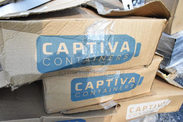 Boxes labeled "Captiva Containers" with visible dents, indicating scratch and dent condition. Includes Advance Tabco MS-2030 stainless shelf.