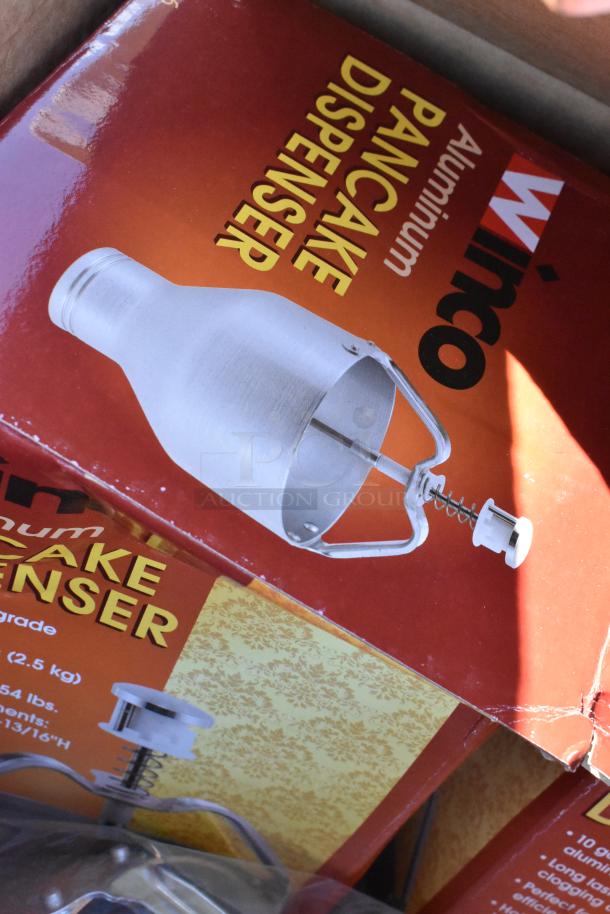 Winco aluminum pancake dispenser in box, brand new condition, part of a lot of scratch and dent items including a food warmer.
