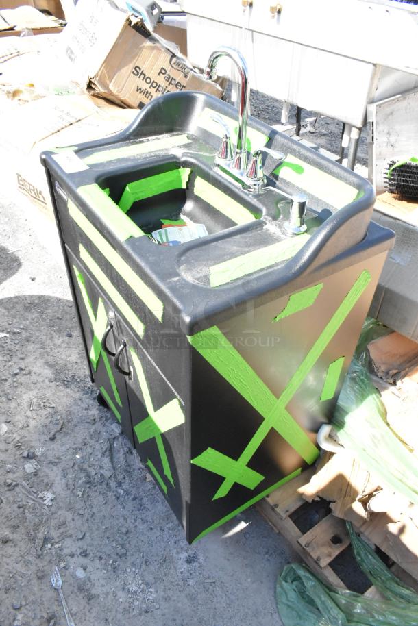 BRAND NEW Ozark River Premier Black Portable Hot Water Hand Sink with single basin and laminate cabinet, marked as scratch and dent.
