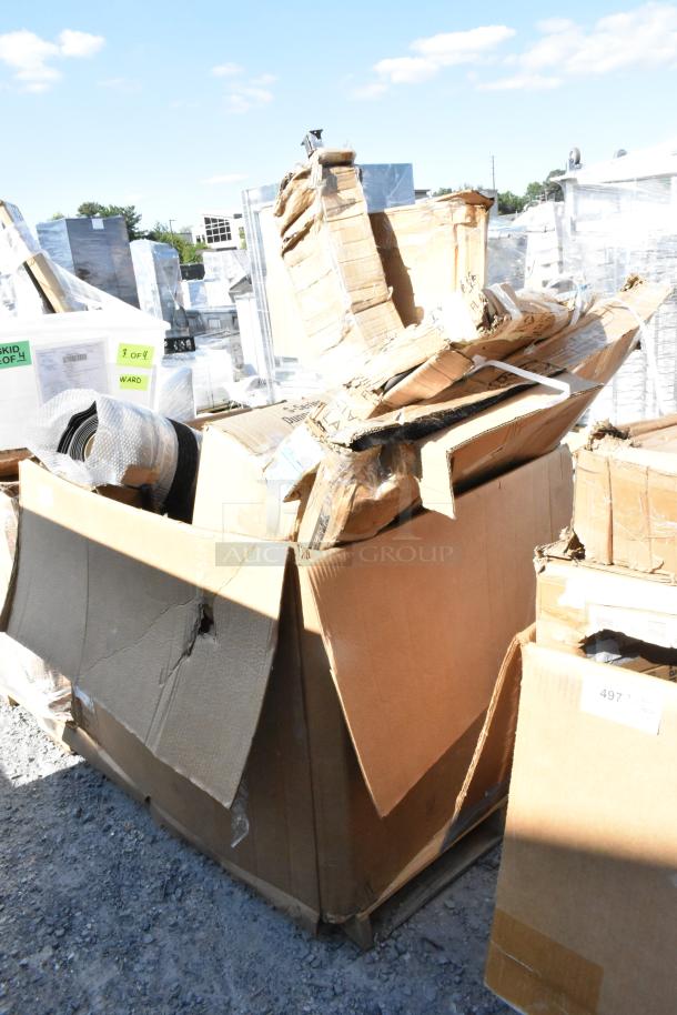 Large box containing 9 brand new scratch and dent items, including Cambro Dunnage Rack and Avantco Salamander, slightly damaged packaging outdoors.