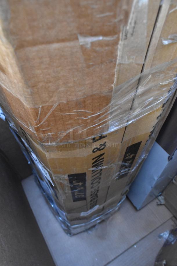 Boxed 7-brand new scratch and dent items, including Fetco coffee dispenser, Regency sink. Tape-sealed cardboard with visible creases.