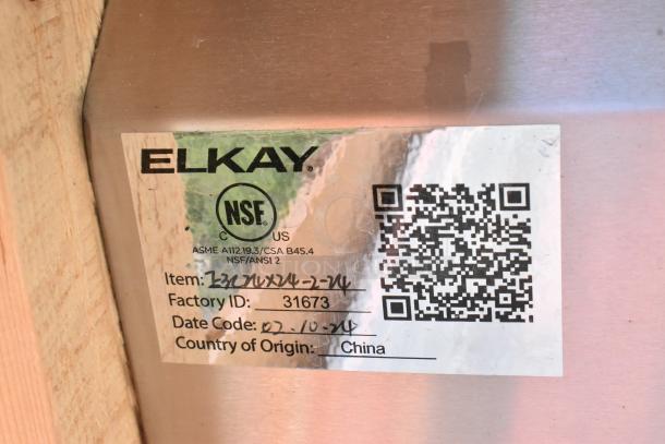 Elkay tag on stainless steel sink, showing NSF certification and factory ID 31673 with a QR code. Origin: China.