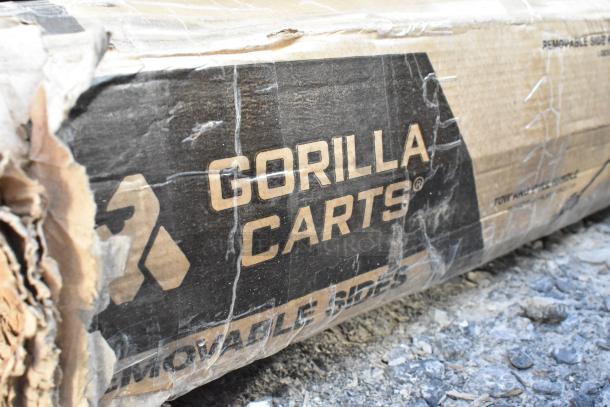 Box labeled "Gorilla Carts" with visible wear. Contains 5 new scratch and dent items, including Lancaster table base parts.