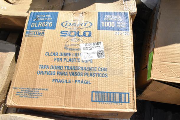 Box of Dart Solo clear dome lids with hole for plastic cups, 1000 count, new condition, barcode visible.
