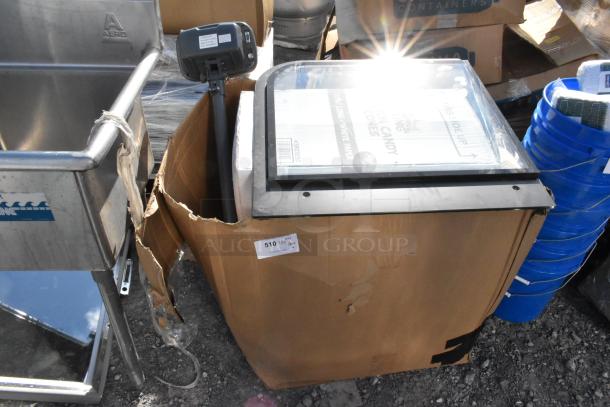 Six item lot including 334FS500TW scale and 3803050 cotton candy cones. Items packaged in a brown box. Auction label: 510.