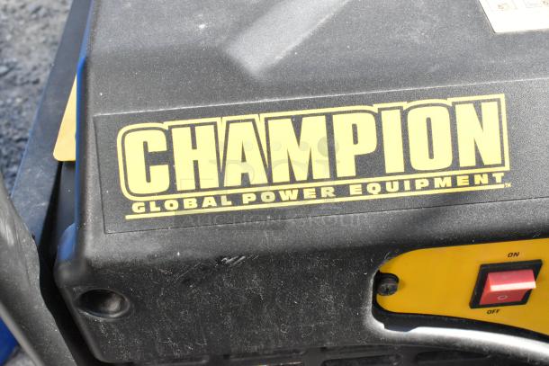 2016 Champion 100222 Portable Generator, black with yellow Champion logo, visible on/off switch, in used condition.
