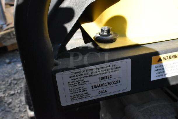 2016 Champion 100222 Portable Generator, labeled with model and serial number. Good condition, visible manufacturer details.