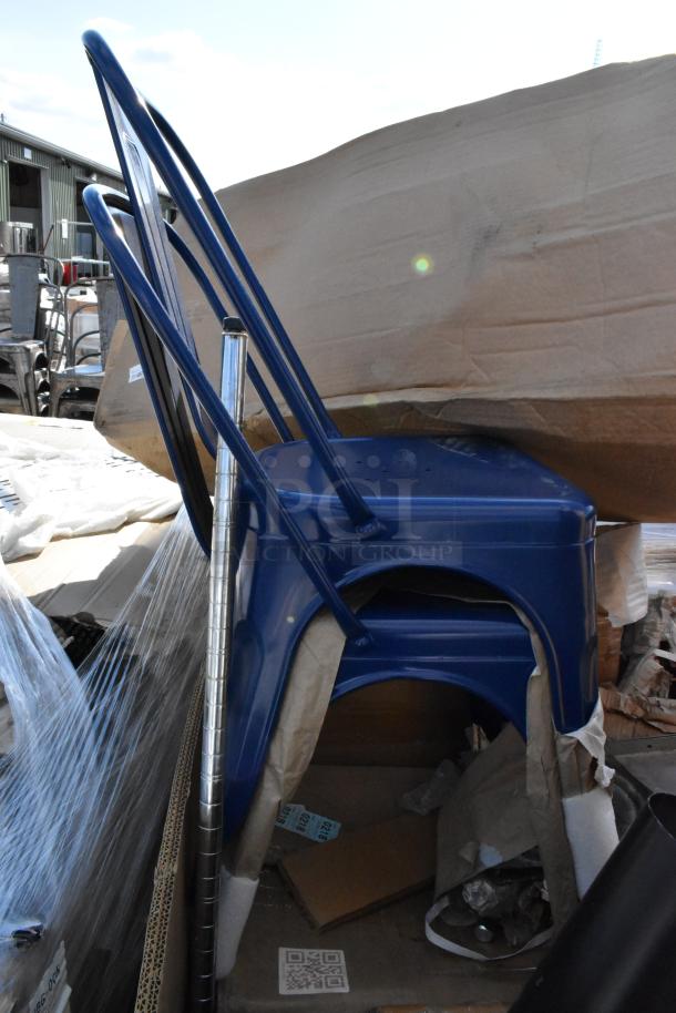 Stack of blue metal Tolix style chairs, scratch and dent condition, new with tags; bundled for auction sale.