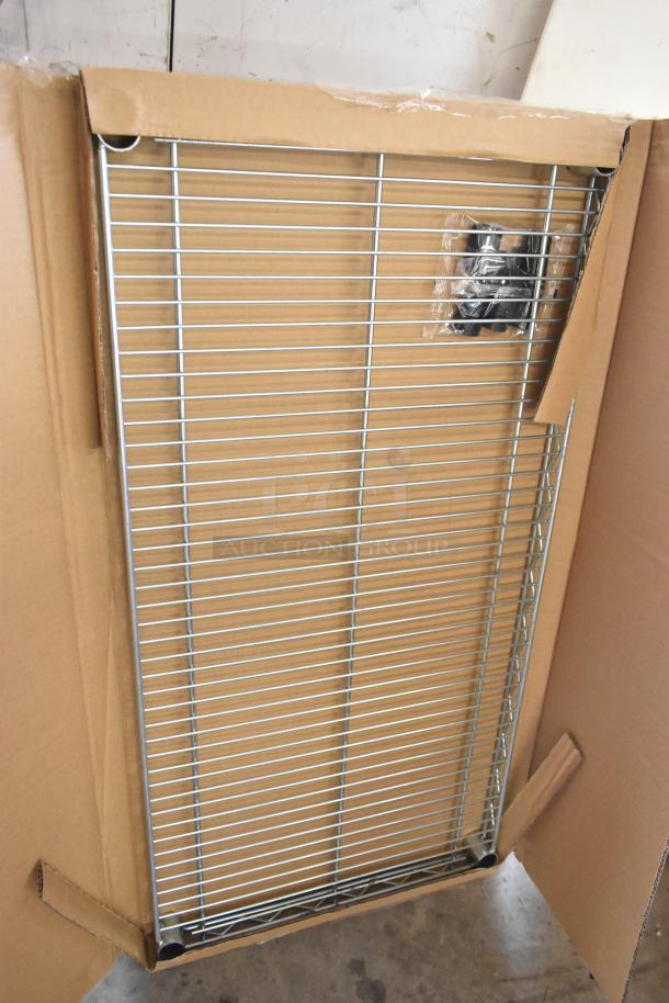 Brand new box of two 5GRU6B chrome wire shelves, pristine condition, shown partially unpacked with packaging intact.