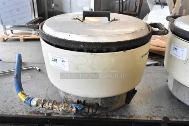 Rinnai RER-55AS-N Natural Gas Rice Cooker, metal finish, with visible wear. Auction tag #315 attached.