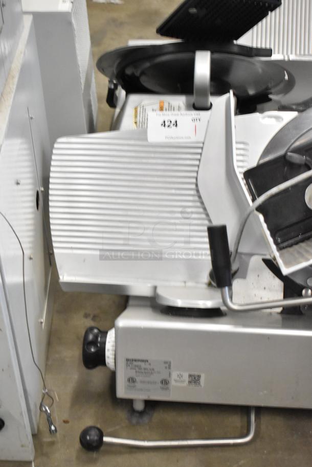 Bizerba GSP H metal commercial meat slicer, countertop model. Features 115 volts, 1 phase. Visible dial and label.