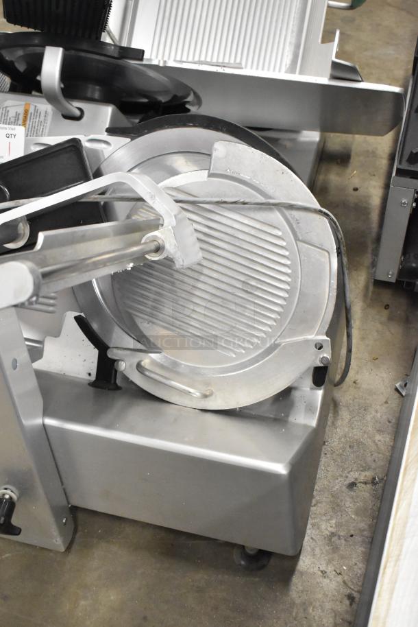 Bizerba GSP H metal commercial countertop meat slicer, 115V, 1 phase, features stainless steel blade and sturdy base.