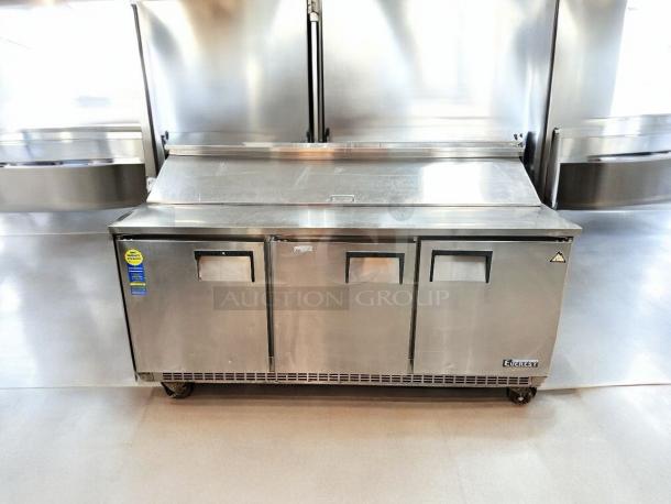 Everest EPBNR3 3-door refrigerated prep table in excellent condition, stainless steel, with manufacturer labels visible.