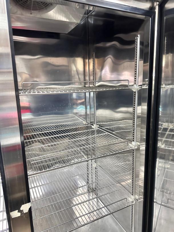 Turbo Air TSR-49SD refrigerator, two-door, stainless steel, excellent condition, adjustable wire shelves, fully tested.