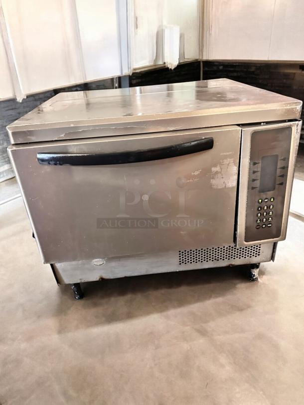 TurboChef NGC Rapid Cook Oven in excellent condition, 208/240V, fully tested and working. Includes control panel and sturdy design.