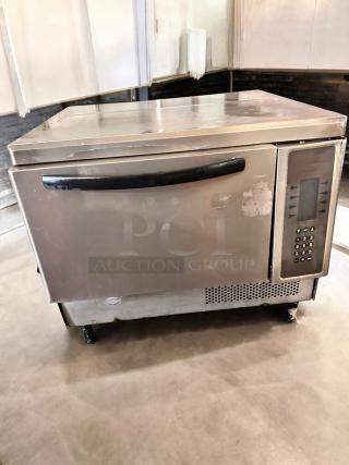 TurboChef NGC Rapid Cook Oven in excellent condition, 208/240V, fully tested and working. Includes control panel and sturdy design.